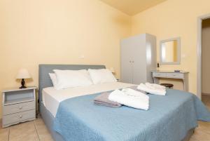 Postel nebo postele na pokoji v ubytování Villa Russa Alexandros + 33 fotografií