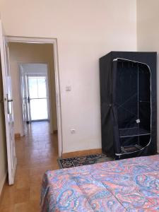 A television and/or entertainment centre at Apartment near the beach