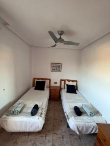 Postel nebo postele na pokoji v ubytování Casa de Don Simón