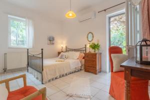 Ένα ή περισσότερα κρεβάτια σε δωμάτιο στο Villa Armi +37 φωτογραφίες