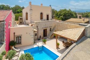 an image of a villa with a swimming pool at Archontiko Galliaki in Áyios Yeóryios