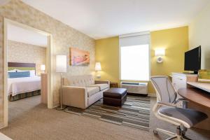 TV a/nebo společenská místnost v ubytování Home2 Suites by Hilton Gillette