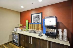 a counter in a hotel room with aasteryasteryasteryasteryasteryasteryasteryastery at Hampton Inn & Suites Grants Pass in Grants Pass