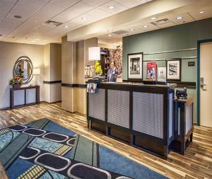 a lobby of a hotel with a reception desk at Hampton Inn Hibbing in Hibbing