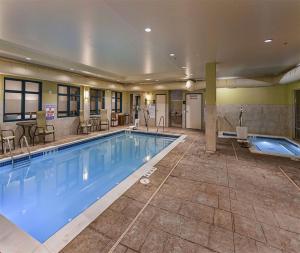 a large swimming pool in a hotel room at Hampton Inn Hibbing in Hibbing