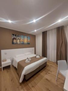 Кровать или кровати в номере Room and Breakfast San Marco