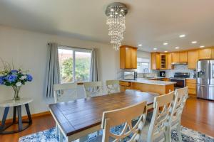 a kitchen with a large wooden table and chairs at Seaside Eureka Vacation Rental with Bay Views! in Eureka