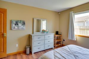 a bedroom with a dresser and a mirror at Seaside Eureka Vacation Rental with Bay Views! in Eureka