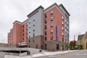 a rendering of the exterior of a hotel at Hampton Inn & Suites Winston-Salem Downtown in Winston-Salem