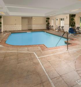 a large swimming pool in a hotel room at Hilton Garden Inn Winston-Salem/Hanes Mall in Winston-Salem
