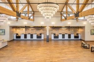 a large hall with wooden floors and exposed beams at Hilton Vacation Club Mystic Dunes Orlando in Orlando