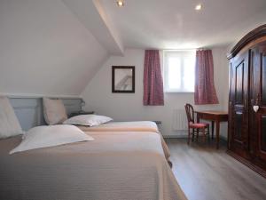 Postel nebo postele na pokoji v ubytování Gîte chez Elouann