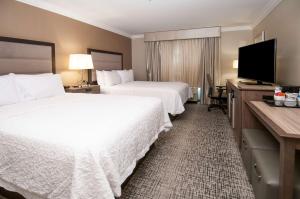 Hampton Inn & Suites Ridgeland客房内的一张或多张床位
