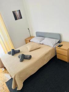 Un pat sau paturi într-o cameră la Nosso Aconchego
