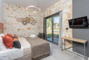 Ένα ή περισσότερα κρεβάτια σε δωμάτιο στο Villa Ersi +43 φωτογραφίες
