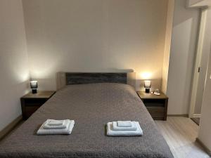 Uma cama ou camas num quarto em Valgemaja Majutus