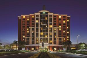 a large building with a dome on top of it at Embassy Suites by Hilton Anaheim South in Anaheim