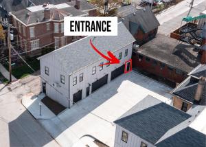 an image of an apartment building with a red arrow at The Loft @ Columbus Center in Columbus