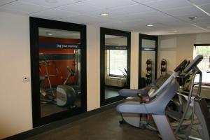 a gym with treadmills and ellipticals in a room at Hampton Inn & Suites Lebanon in Lebanon