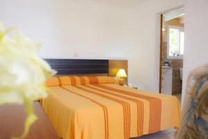 Postel nebo postele na pokoji v ubytování Villa Roca Nova + 30 fotografií