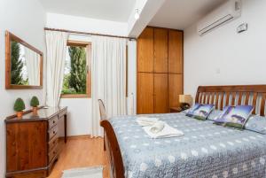 Postel nebo postele na pokoji v ubytování Villa Xenios Dias