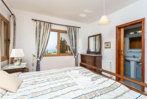 Postel nebo postele na pokoji v ubytování Villa Xenios Dias
