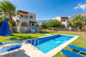 The swimming pool at or close to Spiros Villas Collection