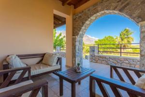 A seating area at Spiros Villas Collection