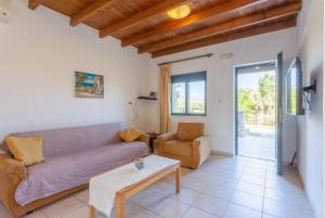 A seating area at Spiros Villas Collection