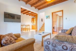 A seating area at Spiros Villas Collection