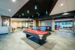 a billiard room with a pool table in it at Tru By Hilton North Little Rock, Ar in North Little Rock