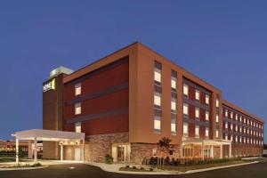 a rendering of the front of a hotel at Home2 Suites By Hilton Lancaster in Lancaster