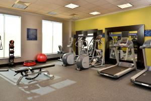 a gym with cardio equipment and exercise bikes at Hampton Inn & Suites Orlando/Downtown South - Medical Center in Orlando