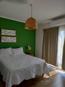 Ein Bett oder Betten in einem Zimmer der Unterkunft Casa con vista a las Montañas