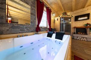 Fotografie z fotogalerie ubytování AL RANCH WELLNESS CADORE DOLOMITI APARTMENTS vicino Cortina Olimpiadi 2026 e Misurina Tre Cime Lavaredo v destinaci Pieve di Cadore
