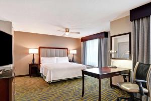 Postel nebo postele na pokoji v ubytování Homewood Suites by Hilton Lake Buena Vista - Orlando