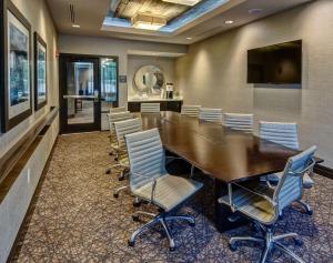 a conference room with a long table and chairs at Hampton Inn & Suites Memphis Germantown in Memphis +30 photos