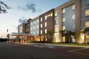 a rendering of a hotel with a parking lot at Home2 Suites By Hilton McAllen in McAllen