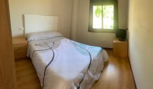 Un pat sau paturi într-o cameră la Zoqueiro1