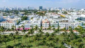 an aerial view of a city with palm trees at Hilton Vacation Club Crescent on South Beach Miami in Miami Beach