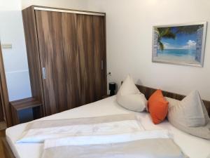 Postel nebo postele na pokoji v ubytování Appartements Antunovic