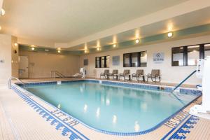 a large swimming pool in a hotel room at Hampton Inn Midland in Midland