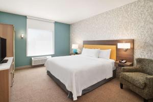 Postel nebo postele na pokoji v ubytování Home2 Suites By Hilton Palm Bay I 95