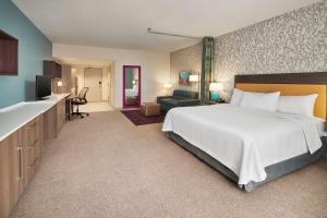 Postel nebo postele na pokoji v ubytování Home2 Suites By Hilton Palm Bay I 95
