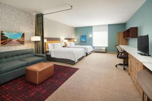 Postel nebo postele na pokoji v ubytování Home2 Suites By Hilton Palm Bay I 95