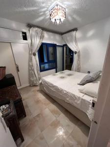 Postel nebo postele na pokoji v ubytování Cabonegro magnifique maison vue sur mer + 12 fotografií