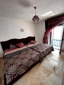 Postel nebo postele na pokoji v ubytování Cabonegro magnifique maison vue sur mer