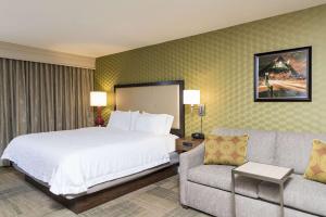 A bed or beds in a room at Hampton Inn Mount Pleasant