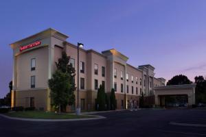 a hotel with a sign on the side of a building at Hampton Inn & Suites Nashville-Smyrna in Smyrna