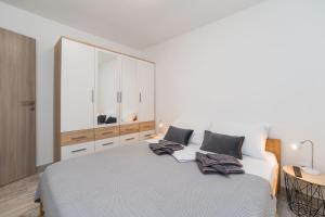 Postel nebo postele na pokoji v ubytování Vila Zara + 37 fotografií